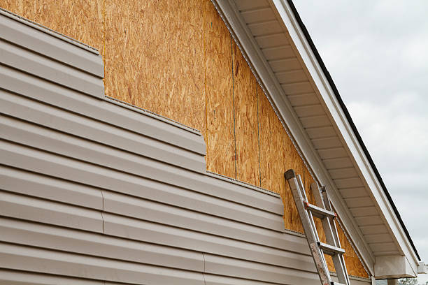 Professional Siding technician working in Juliustown, NJ